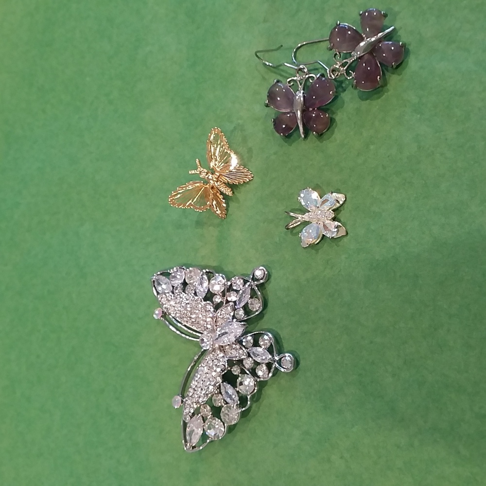 Bundle of Butterflies has Earrings, Pendant and 2 Pins in Silver and Gold tones.
